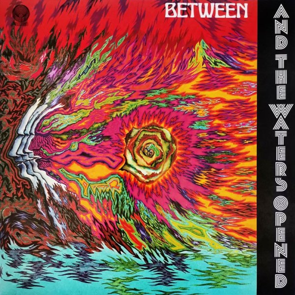 Between • And The Waters Opened